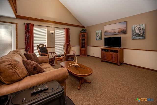 living room with vaulted ceiling and carpet flooring