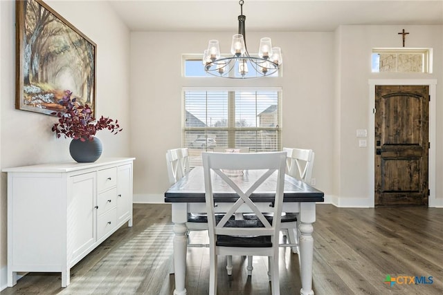 837 Gallant Fox Rd, Hewitt, TX 76643 - dining space with a chandelier, wood finished floors, and baseboards