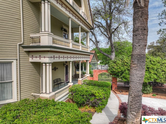 doorway to property featuring a balcony