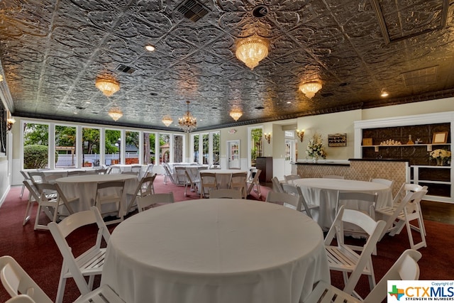 dining space featuring a chandelier