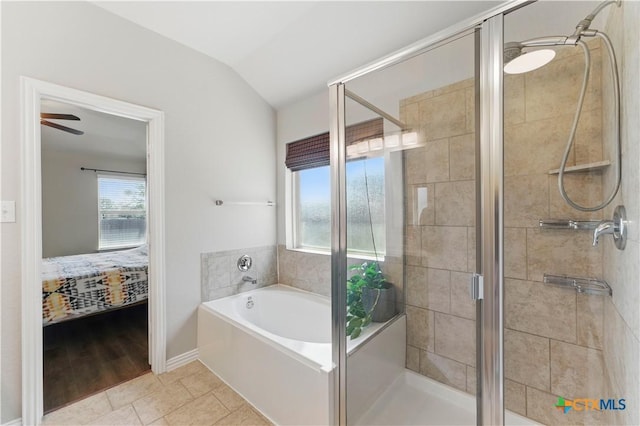 full bath featuring a garden tub, a stall shower, ensuite bathroom, and lofted ceiling