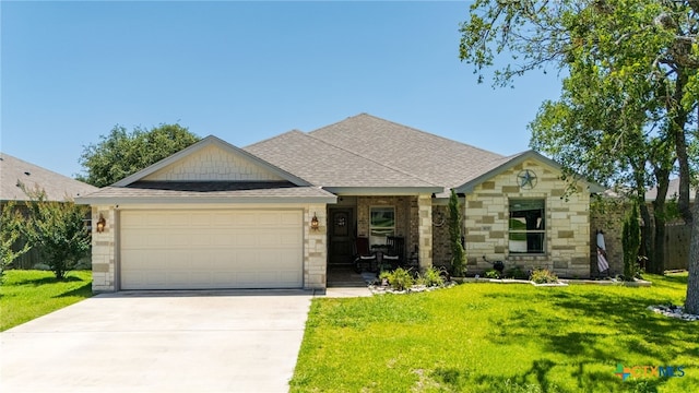1037 Declaration Dr, Copperas Cove, TX 76522 - view of front of house featuring an attached garage, a front lawn, driveway, roof with shingles, and stone siding