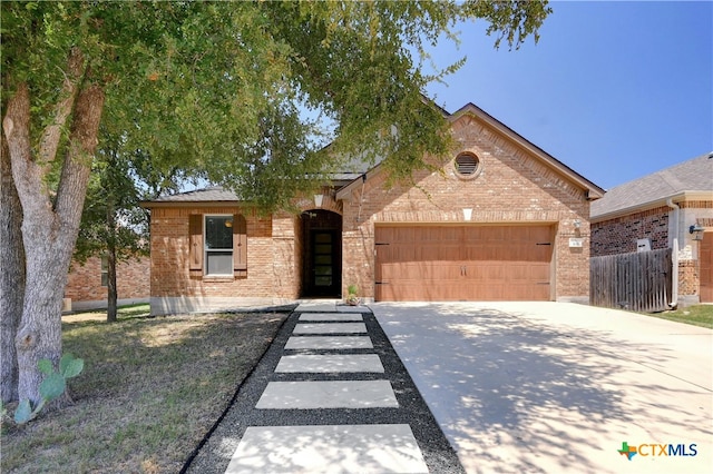 ranch-style home with a garage