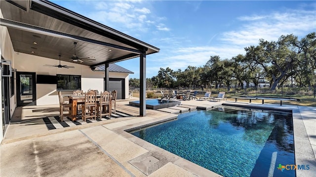 view of pool featuring a patio area and ceiling fan