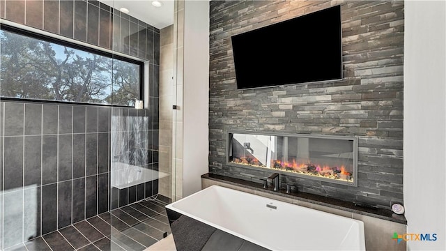 bathroom featuring a washtub