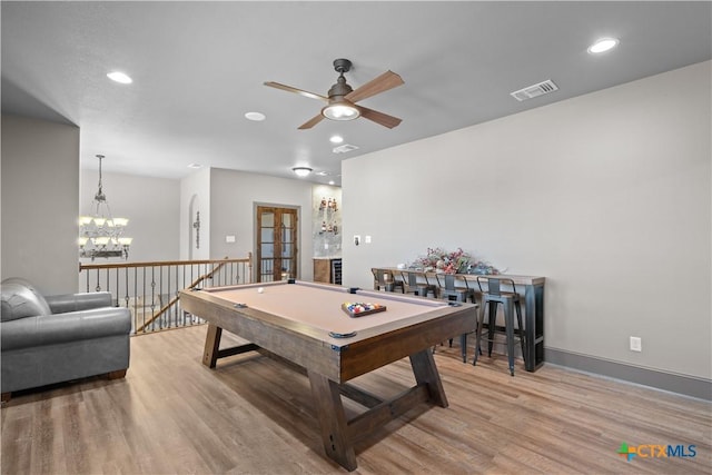 rec room featuring light hardwood / wood-style flooring, ceiling fan, and billiards