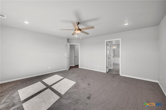 unfurnished bedroom with recessed lighting, carpet floors, and baseboards