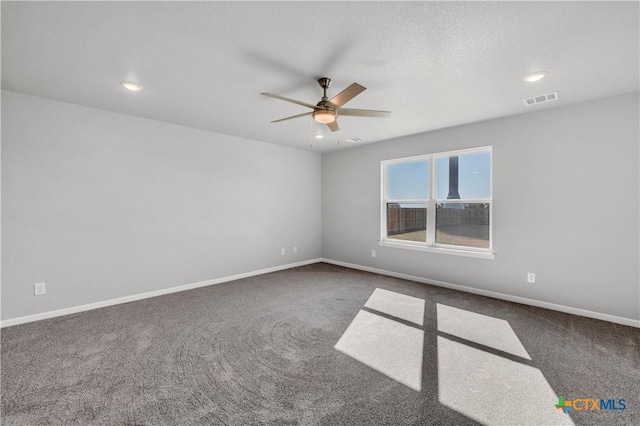 carpeted empty room with ceiling fan, baseboards, visible vents, and recessed lighting