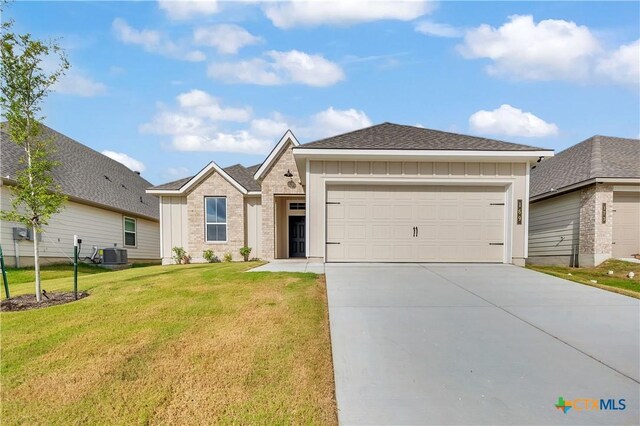 169 Arvil Dr, Killeen, TX 76542 - kitchen featuring appliances with stainless steel finishes, open floor plan, light countertops, a sink, and baseboards