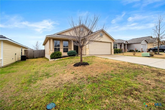 ranch-style house with cooling unit, a garage, and a front yard