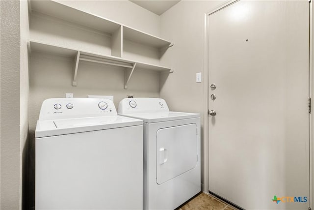 laundry area with independent washer and dryer