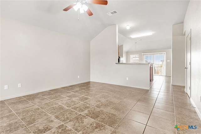 unfurnished living room featuring ceiling fan, lofted ceiling, and tile patterned floors