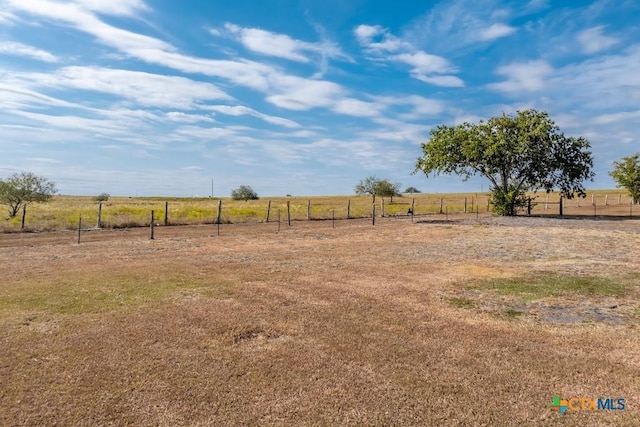 3300 State Highway 95, Shiner, TX 77984 - view of yard featuring a view of rural / pastoral area and fence
