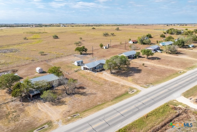 birds eye view of property featuring a rural view