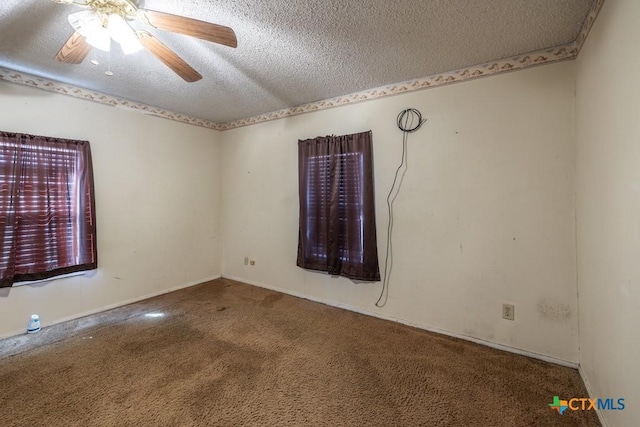 3300 State Highway 95, Shiner, TX 77984 - carpeted spare room with a textured ceiling and a ceiling fan