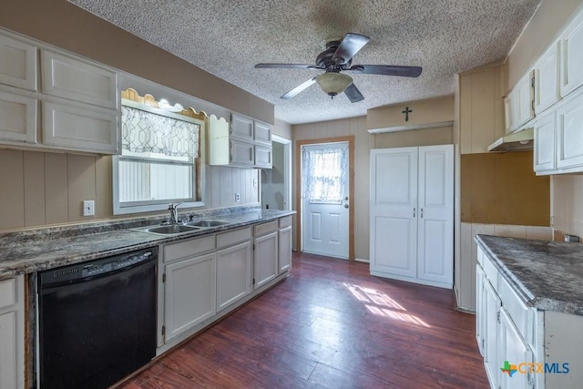 3300 State Highway 95, Shiner, TX 77984 - kitchen with dishwasher, a sink, a textured ceiling, dark wood finished floors, and a ceiling fan
