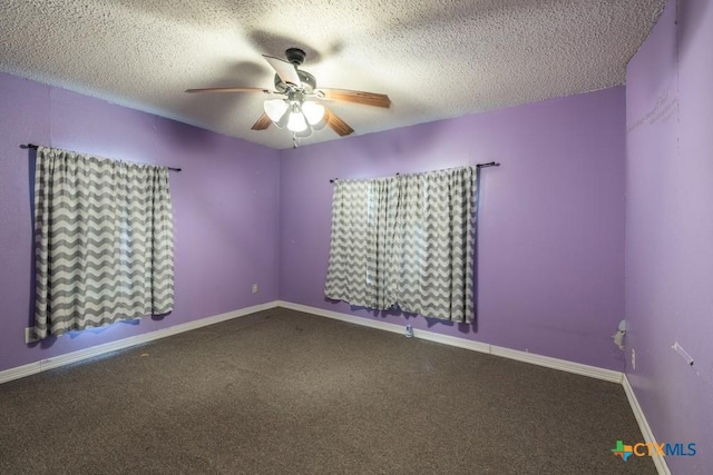 3300 State Highway 95, Shiner, TX 77984 - unfurnished room with a ceiling fan, carpet floors, a textured ceiling, and baseboards