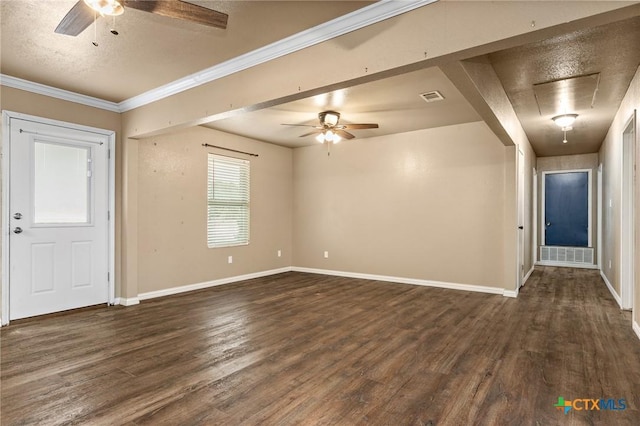 empty room with ceiling fan, ornamental molding, and dark hardwood / wood-style floors