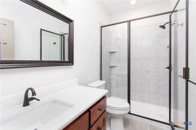 6864 Moffat Loop, Temple, TX 76502 - full bathroom with vanity, a stall shower, and toilet