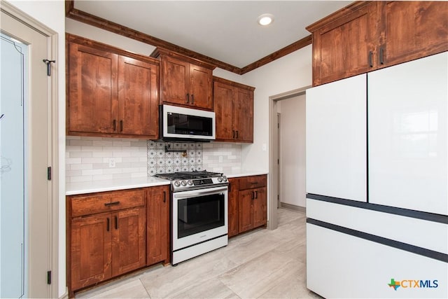 6864 Moffat Loop, Temple, TX 76502 - kitchen featuring ornamental molding, white appliances, recessed lighting, light countertops, and backsplash