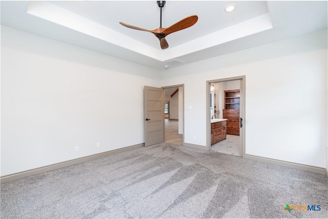 6864 Moffat Loop, Temple, TX 76502 - unfurnished bedroom featuring light carpet, a raised ceiling, recessed lighting, baseboards, and visible vents