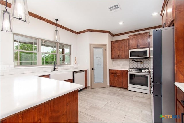 6864 Moffat Loop, Temple, TX 76502 - kitchen with backsplash, visible vents, crown molding, a sink, and stainless steel appliances
