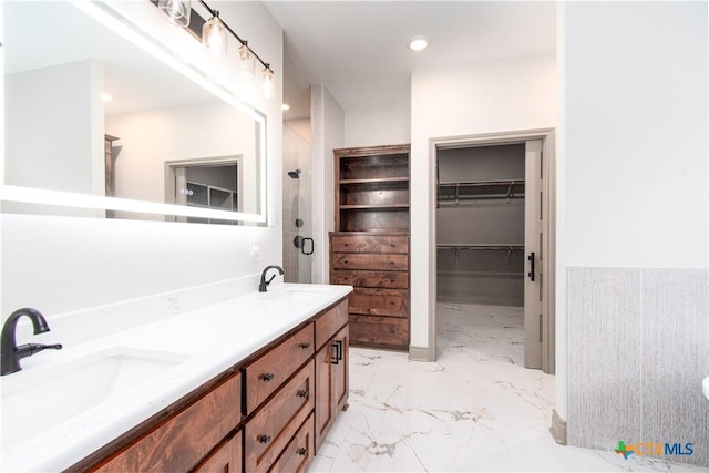6864 Moffat Loop, Temple, TX 76502 - bathroom featuring double vanity, a sink, a walk in closet, and a shower
