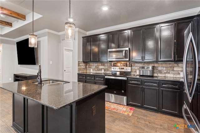 1606 Fiddle Wood Way, Temple, TX 76502 - kitchen featuring stainless steel appliances, a sink, dark stone countertops, tasteful backsplash, and crown molding
