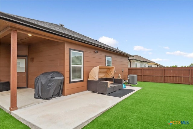 1606 Fiddle Wood Way, Temple, TX 76502 - back of house with a patio, an outdoor living space, and cooling unit