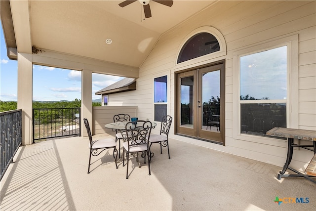 view of patio featuring ceiling fan