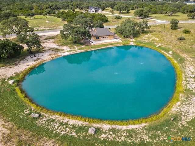 bird's eye view with a water view