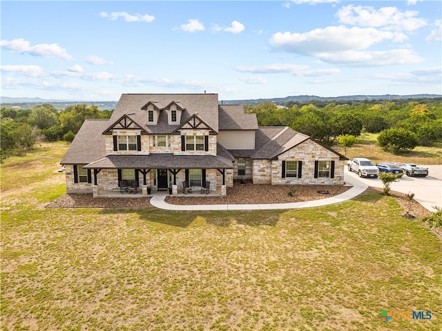 view of front of home featuring a front yard