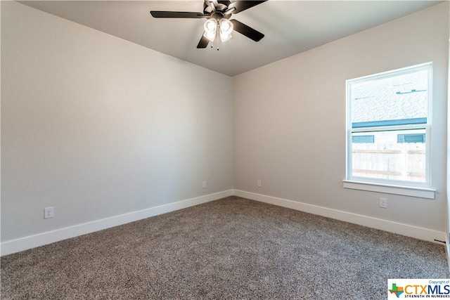 carpeted empty room with ceiling fan