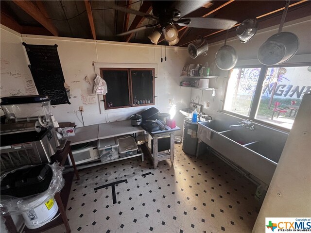 kitchen featuring ceiling fan