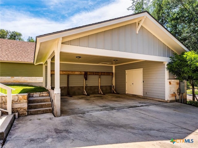 207 Yale St, San Marcos, TX 78666 - garage featuring driveway and an attached carport