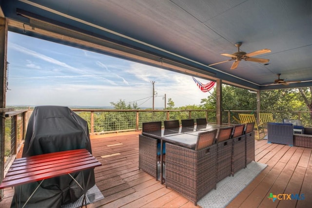deck with ceiling fan and outdoor lounge area