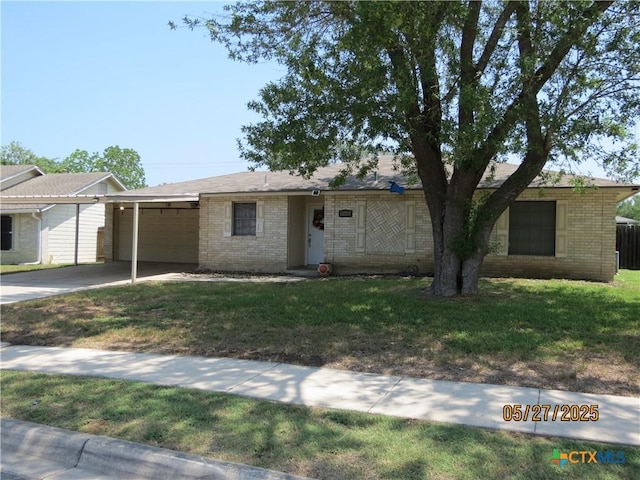 13722 Earlywood St, San Antonio, TX 78233 - ranch-style house featuring a garage, brick siding, driveway, and a front yard