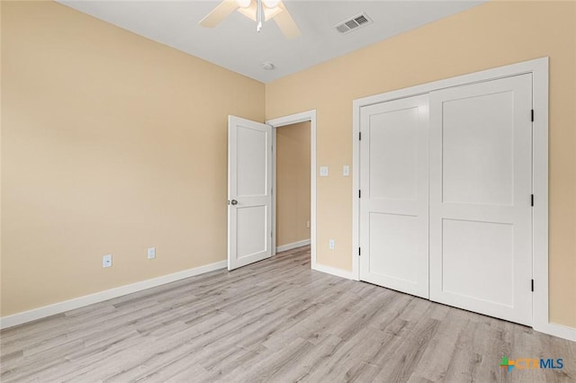 1700 Proctor Ave, Waco, TX 76708 - unfurnished bedroom featuring wood finished floors, baseboards, a closet, and ceiling fan