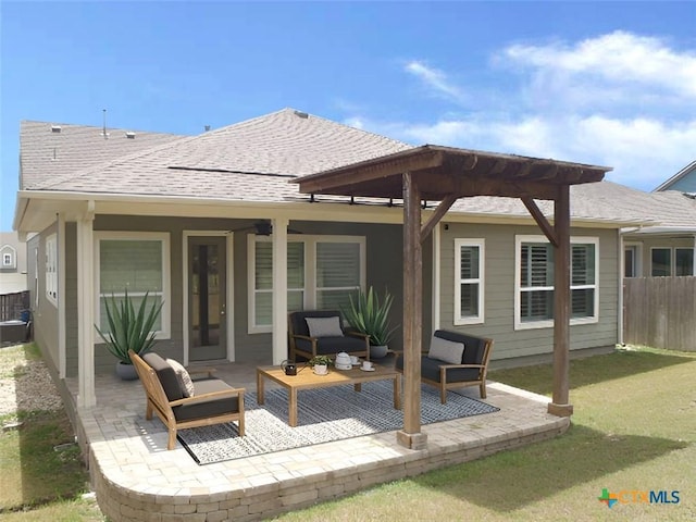 791 Hazy Hills Loop, Dripping Springs, TX 78620 - rear view of house with a shingled roof, a patio area, and outdoor lounge area