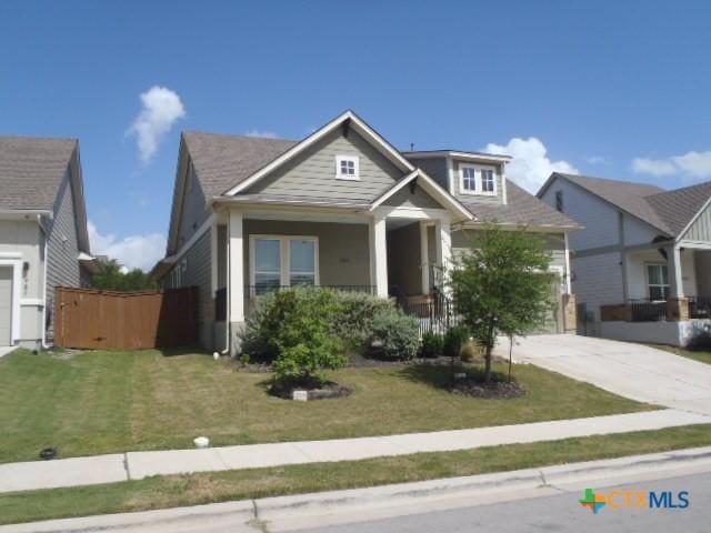 791 Hazy Hills Loop, Dripping Springs, TX 78620 - craftsman-style home with driveway and covered porch