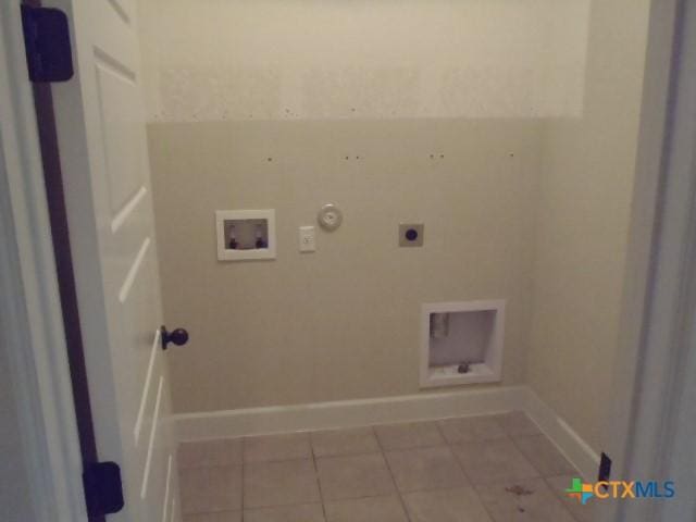 791 Hazy Hills Loop, Dripping Springs, TX 78620 - washroom featuring hookup for an electric dryer, gas dryer hookup, tile patterned floors, and hookup for a washing machine