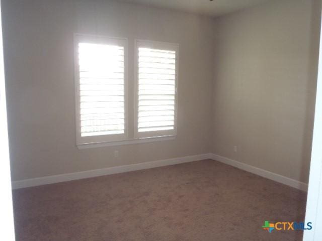 791 Hazy Hills Loop, Dripping Springs, TX 78620 - unfurnished room with carpet flooring and baseboards