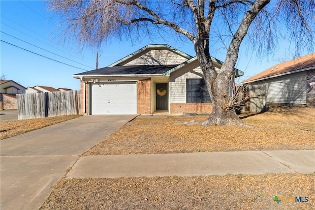 ranch-style home featuring a garage