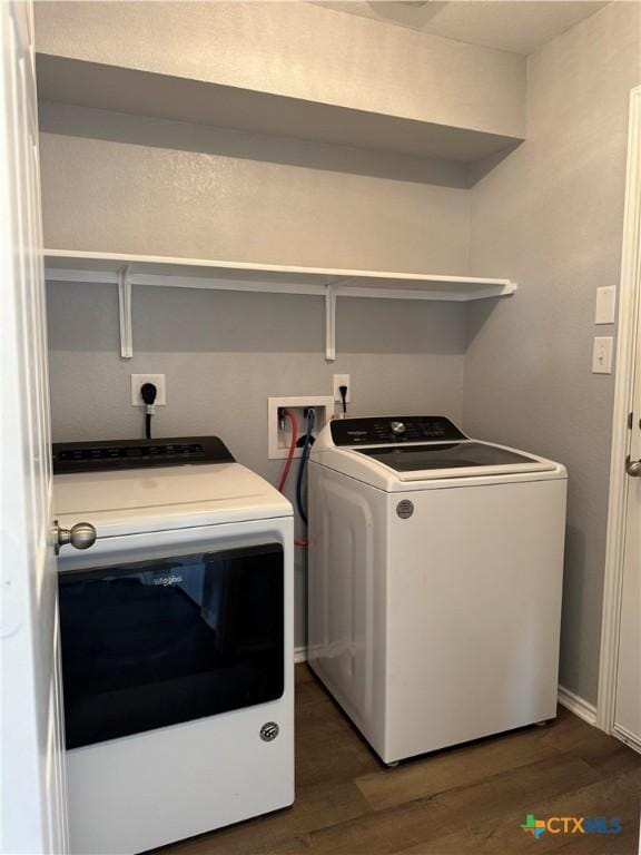 3413 Malmaison Rd, Killeen, TX 76542 - laundry room with independent washer and dryer and dark wood-style floors