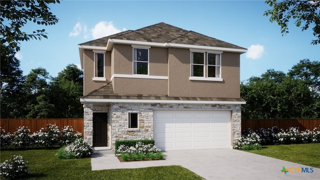 view of front of house featuring a front yard and a garage