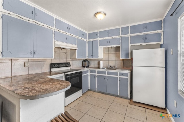 kitchen featuring blue cabinetry, sink, light tile patterned floors, white refrigerator, and electric range