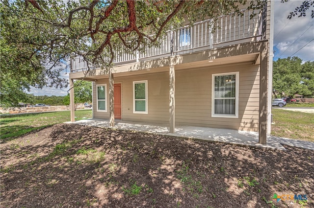 back of property with a patio area