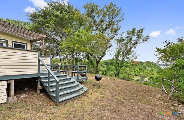 view of yard with a wooden deck