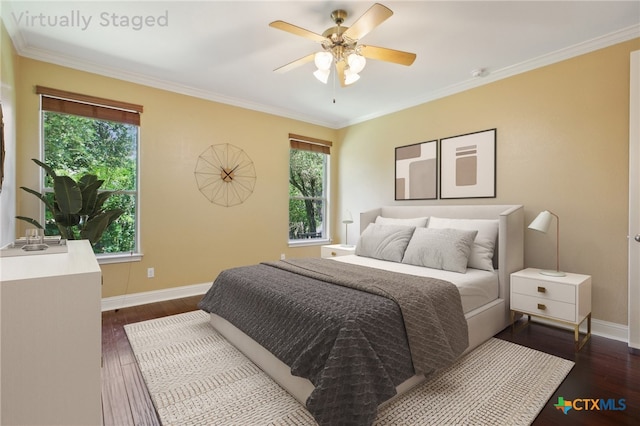 12109 Bryony Dr, Austin, TX 78739 - bedroom with baseboards, dark wood finished floors, crown molding, and ceiling fan