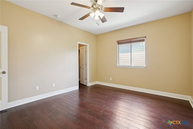 12109 Bryony Dr, Austin, TX 78739 - spare room with baseboards, dark wood finished floors, ceiling fan, and a smoke detector